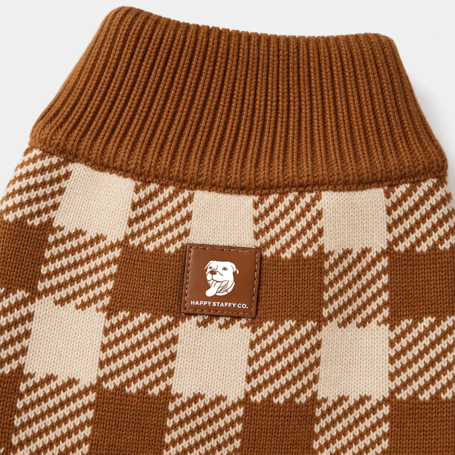 Close-up of the Happy Staffy Co. patch on the dog sweater