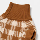 Close-up of the dog sweater’s ribbed turtleneck and arm opening